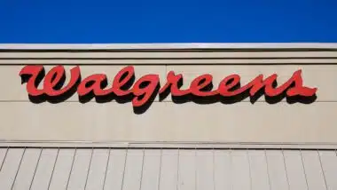 Red script logo sign on Walgreens store in closeup