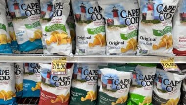 Display of various flavors and varieties of Cape Cod potato chips at a grocery store