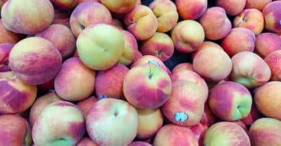 Close up of peaches at grocery store