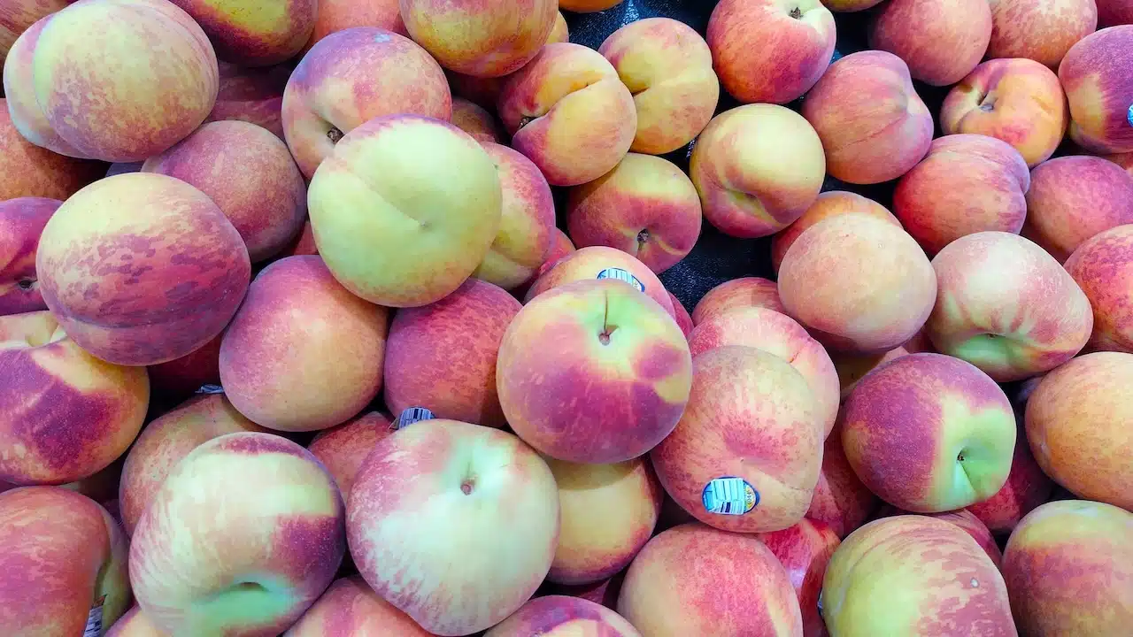 Close up of peaches at grocery store