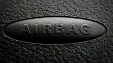 Close-up of airbag inscription on a car dashboard.