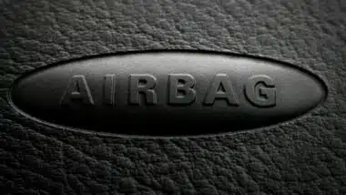 Close-up of airbag inscription on a car dashboard.