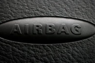 Close-up of airbag inscription on a car dashboard.