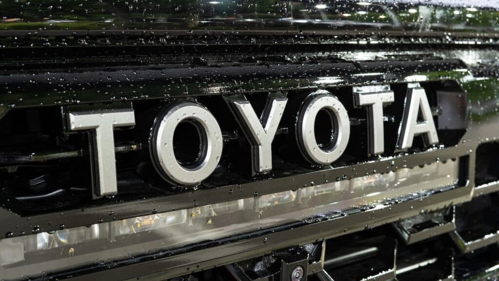Toyota Motor Corporation Brand Logo Emblem Badge On Front Grill Of A New Vehicle
