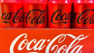 Coca-Cola Zero Sugar cans displayed in bright red packaging