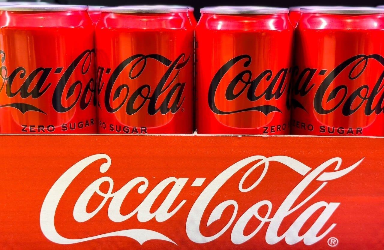 Coca-Cola Zero Sugar cans displayed in bright red packaging