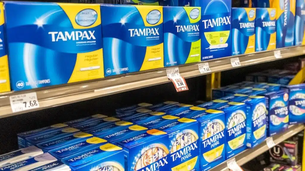 Boxes of Tampax Brand tampons in a supermarket shelf