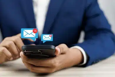 man using smartphone with email