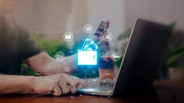 Man Hand Using laptop for Online Payment by Digital Wallet