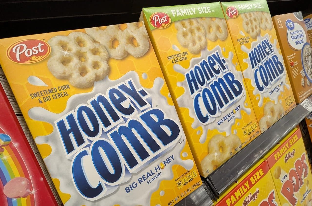 Boxes of Honey Comb Brand Breakfast Cereal Products on Store Shelf at Walmart