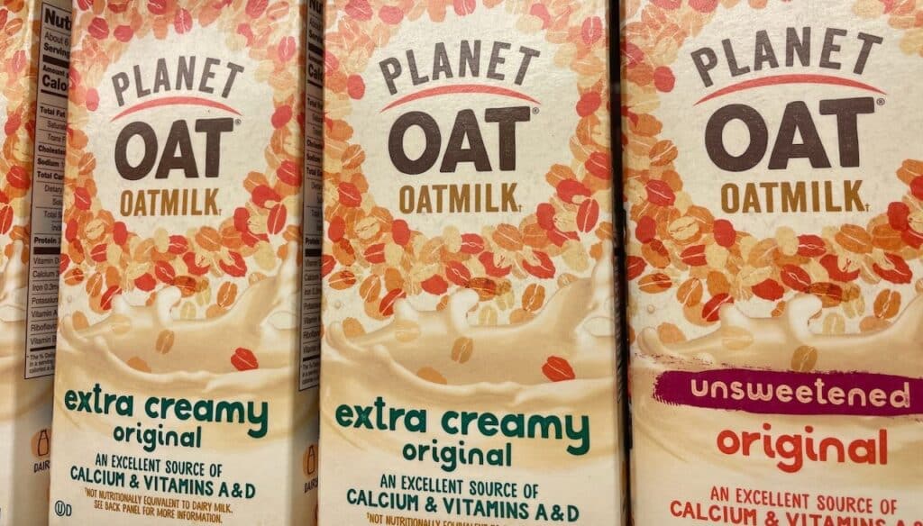 Grocery store Planet Oat Oat Milk on dairy shelf