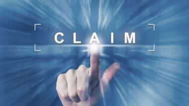 hand clicking on claim button with zoom effect background