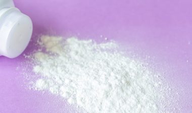 baby powder on purple background