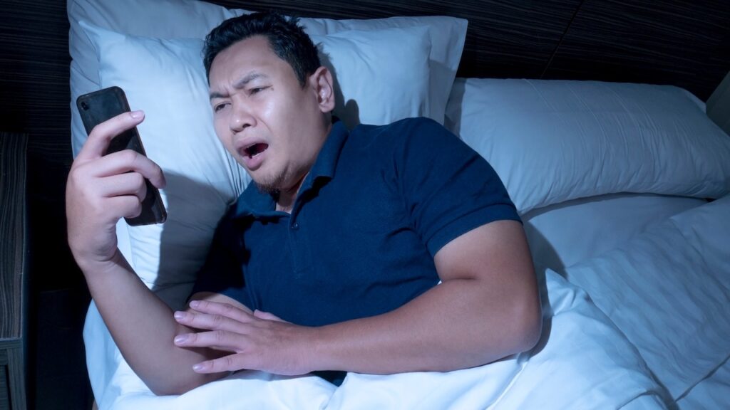 on phone at midnight concept