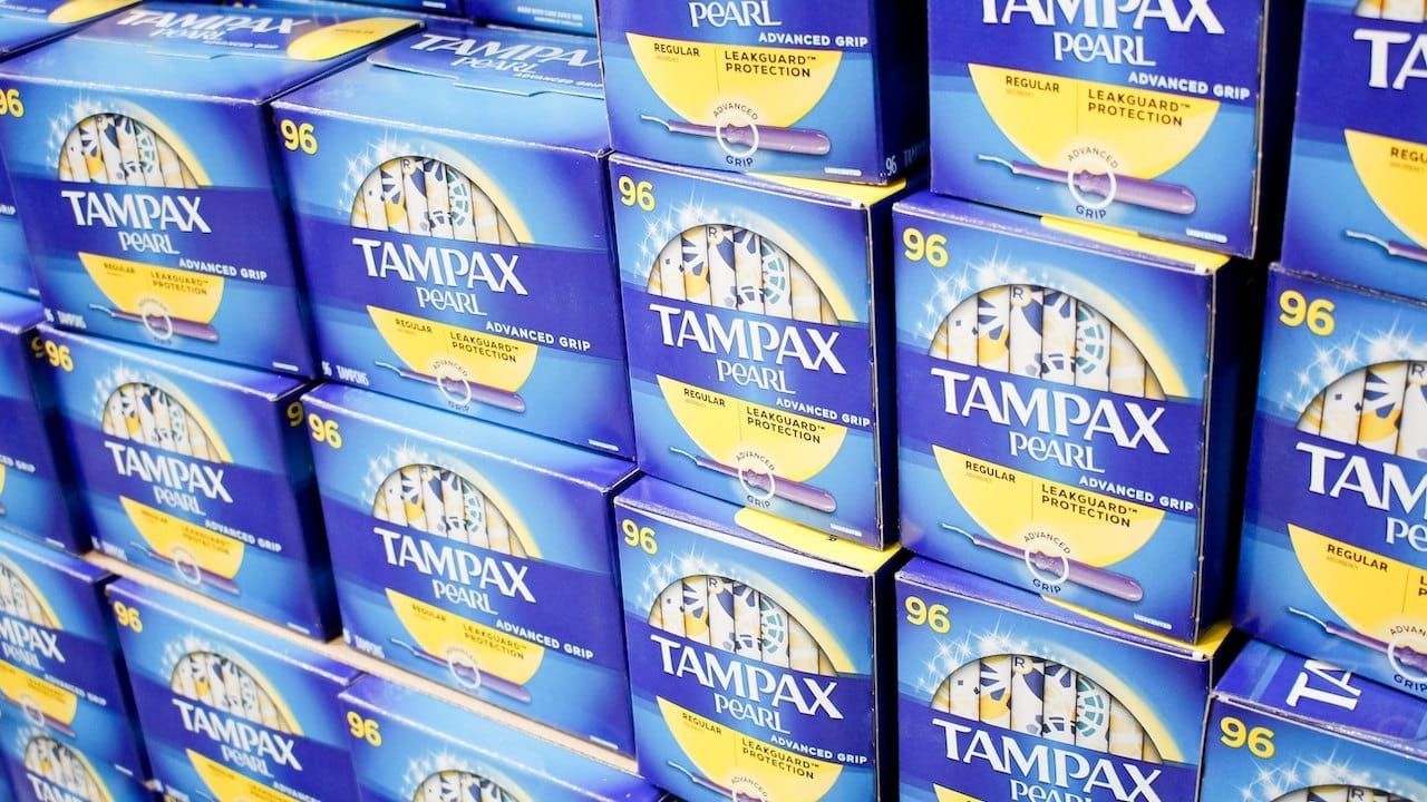 A view of several cases of Tampax Pearl tampons, on display at a local big box grocery store.