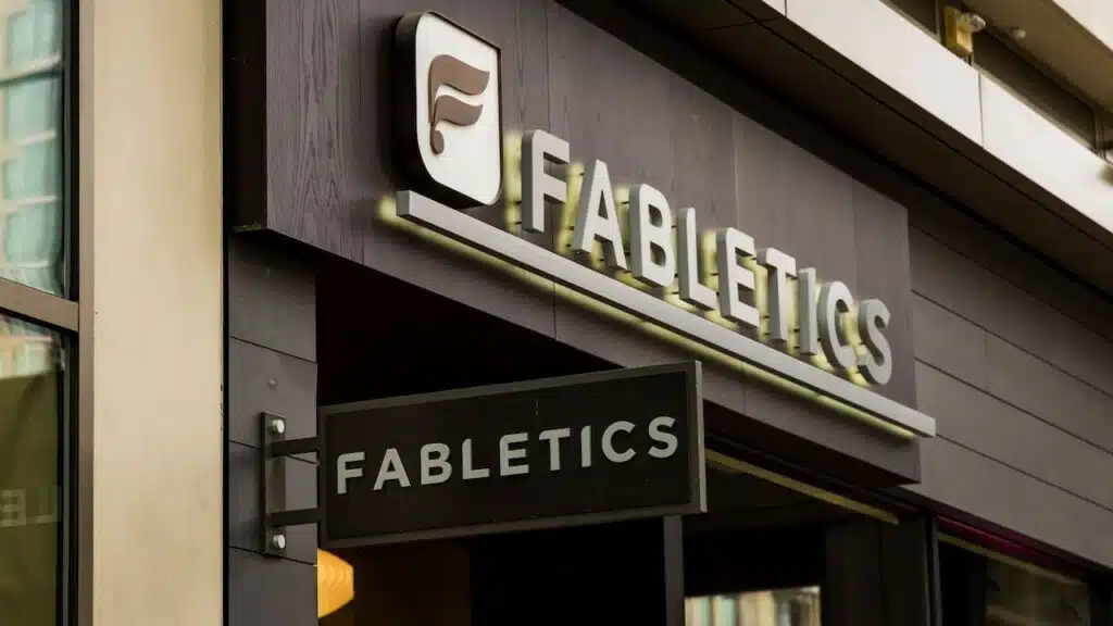 The facade of a Fabletics storefront is displayed.