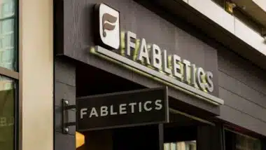 The facade of a Fabletics storefront is displayed.
