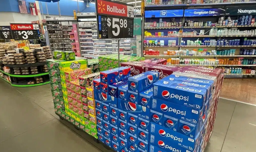 Walmart retail store interior Pepsi pallet display various soft drinks