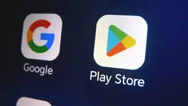 Close-up view of Google Play Store app icon on device screen.