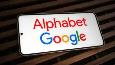 Alphabet and Google logo displayed on mobile device