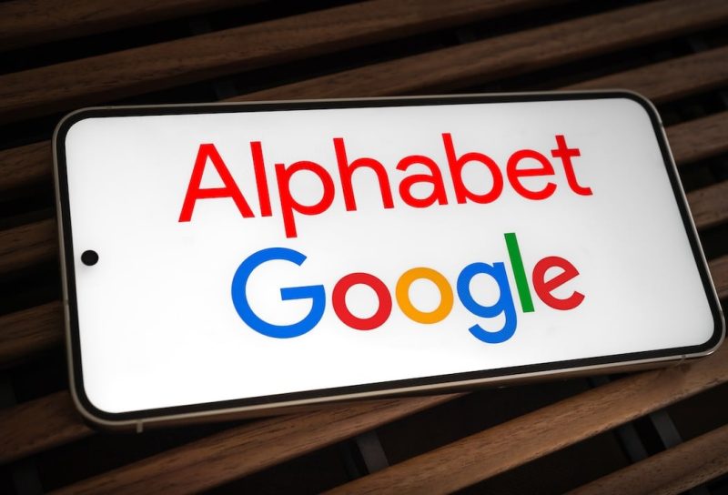Alphabet and Google logo displayed on mobile device