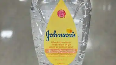 a bottle of Johnson's shea and cocoa butter oil gel in a store