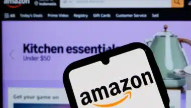 In this photo illustration, Amazon logo is displayed on a smartphone.