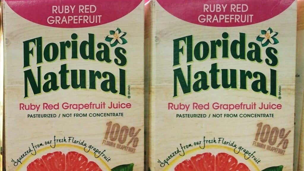 Florida's natural citrus juice on store shelf.