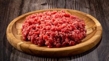 Raw ground beef ready for preparation.