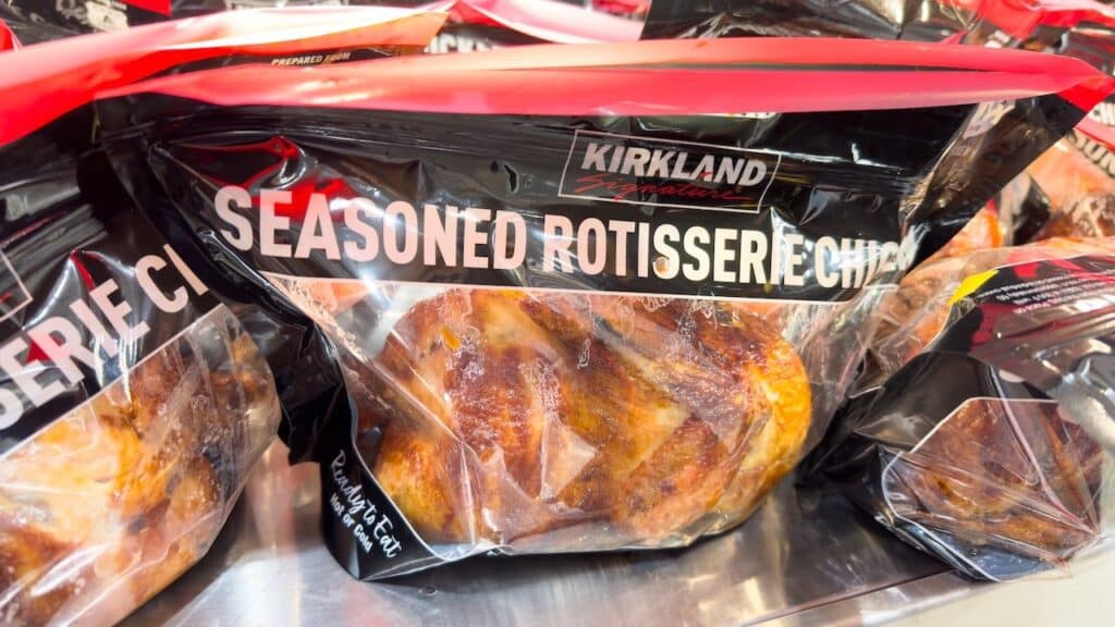 Costco warehouse rotisserie chicken in a bag on display at local club.