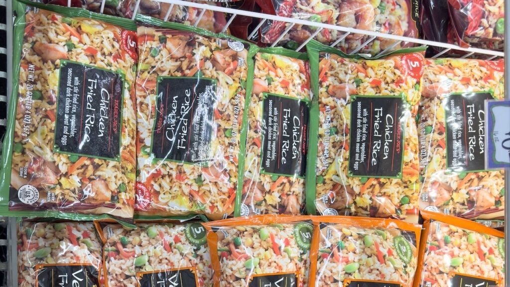 A view of several packages of Trader Joe's fried rice.