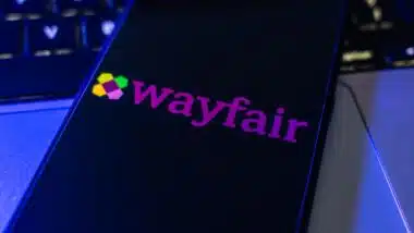 Wayfair e-commerce marketplace logo on the phone screen