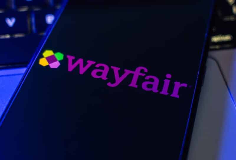 Wayfair e-commerce marketplace logo on the phone screen