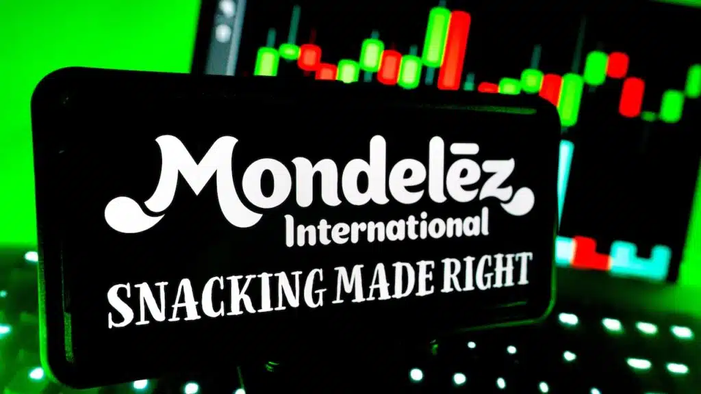 Mondelez International Company Logo Branding on Screen with Stock Chart Market Trends in Background with LED Vibrant Lighting
