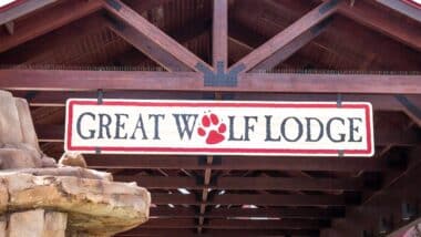 A view of the building sign for the resort Great Wolf Lodge