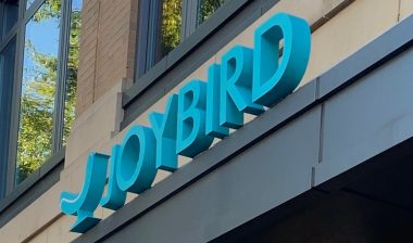 JOYBIRD retail brand logo sign at store entrance