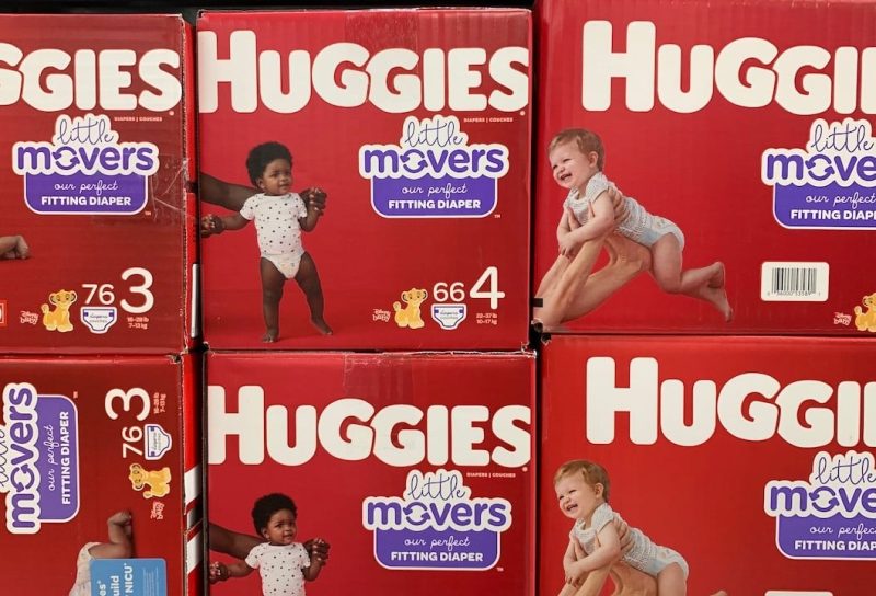 Boxes of Huggie's Little Movers diapers on display on a grocery store shelf