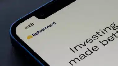 Closeup of Betterment logo seen on its app login page on an iPhone.