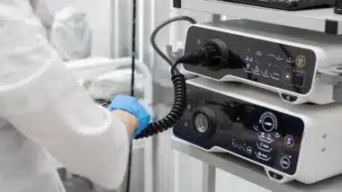 Endoscopy in the hospital. The doctor connects the endoscope before gastroscopy.
