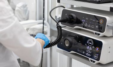 Endoscopy in the hospital. The doctor connects the endoscope before gastroscopy.