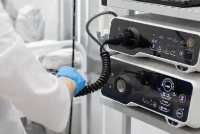 Endoscopy in the hospital. The doctor connects the endoscope before gastroscopy.