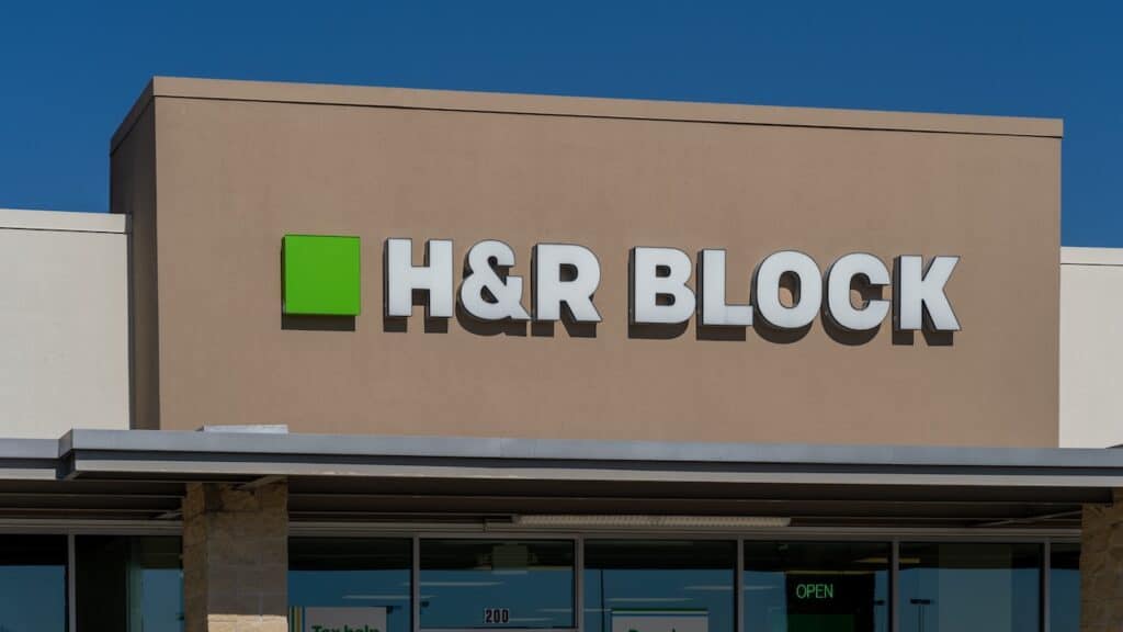 Close up of H and R Block office sign on the building.