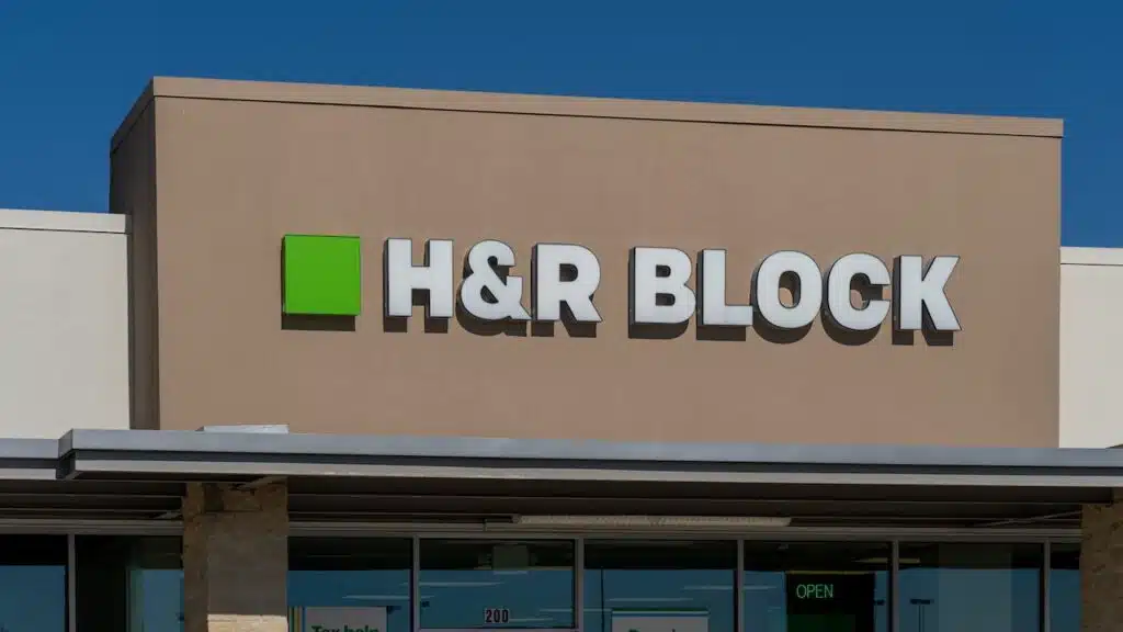 Close up of H and R Block office sign on the building.