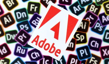 Paper logos of most popular adobe products on white background.