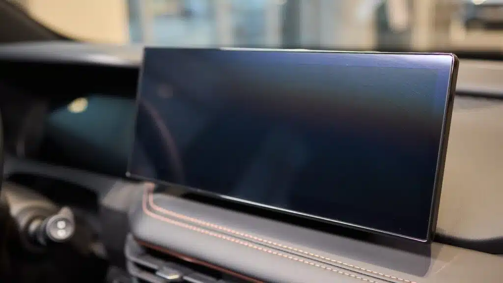 The Modern Car Dashboard Touchscreen Display features a sleek and futuristic interface design