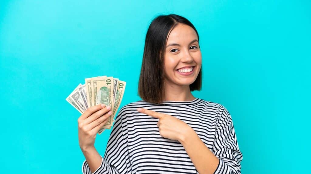 woman holding money