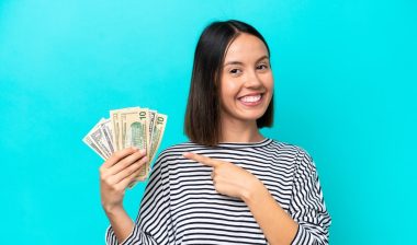 woman holding money