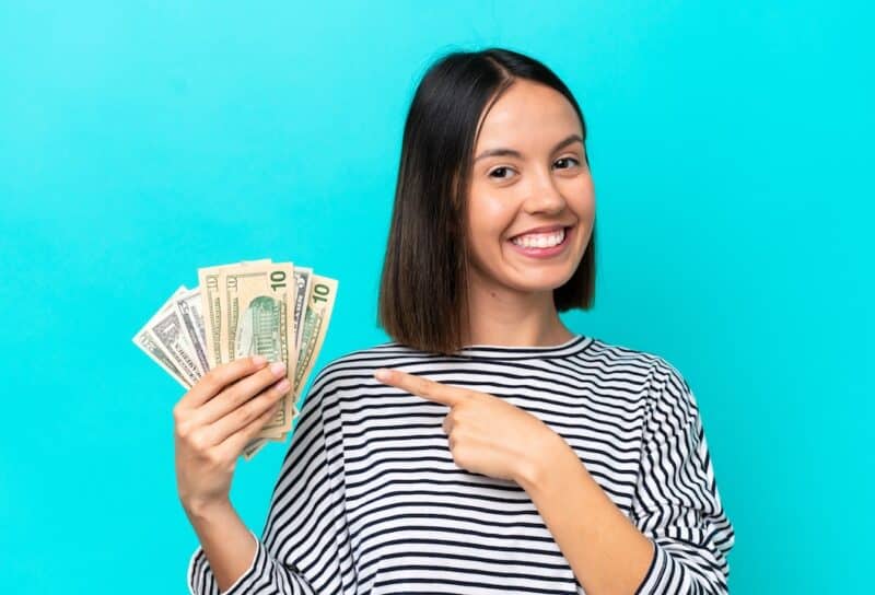 woman holding money