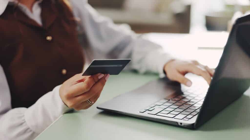 laptop and credit card for payment