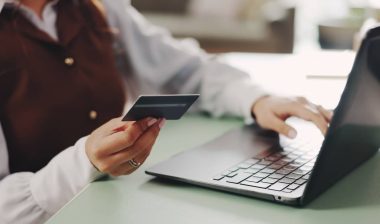 laptop and credit card for payment